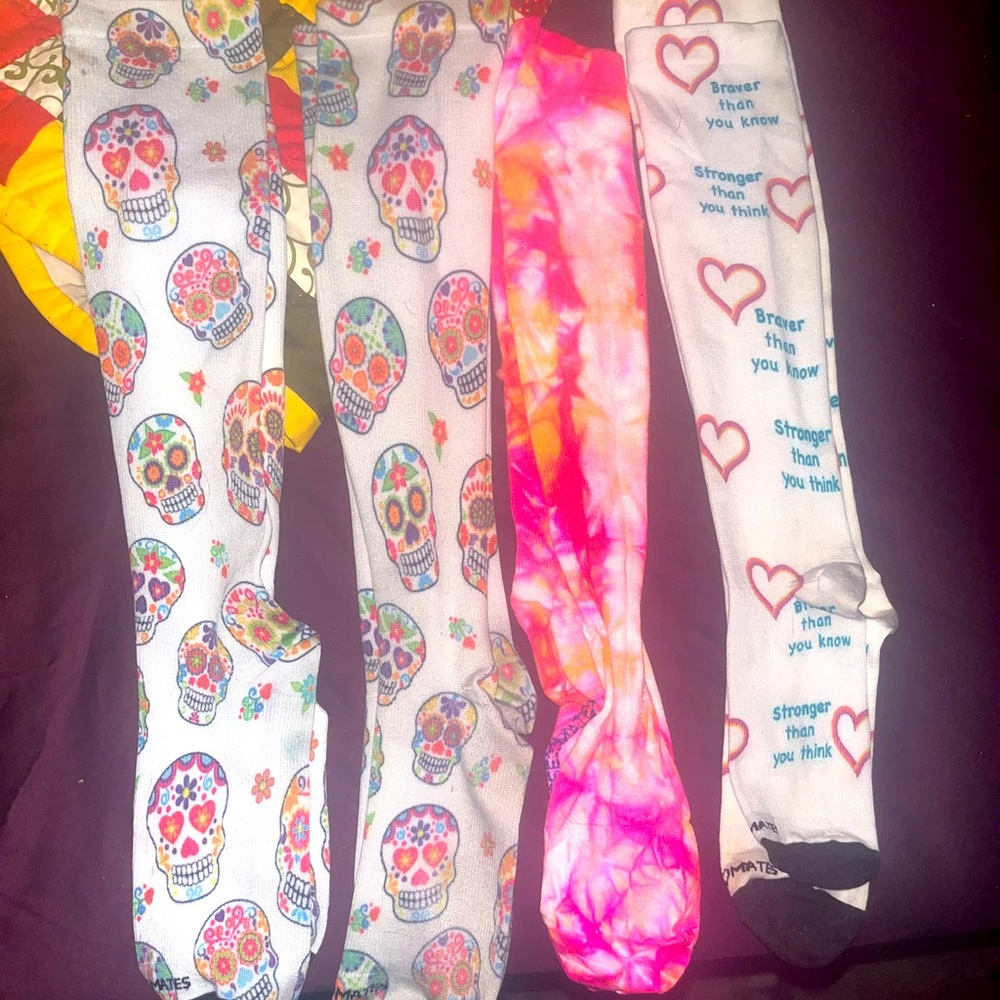 4 pairs of Nurse Mates compression socks in good used condition